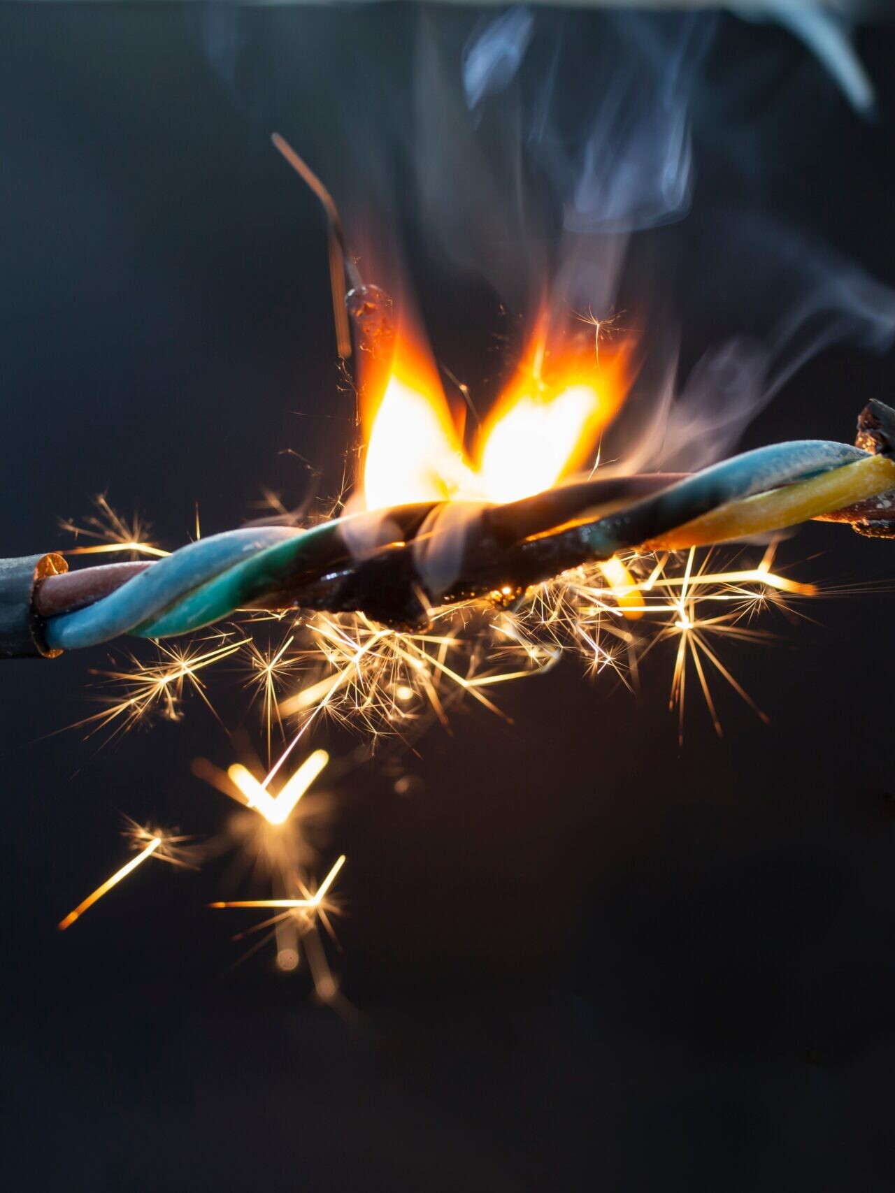 Flame,Smoke,And,Sparks,On,An,Electrical,Cable,,Fire,Hazard 1